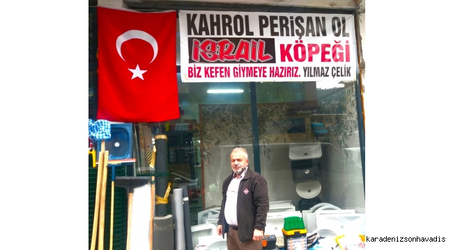 RİZELİ ESNAF BARBAR İSRAİL’E TEPKİSİNİ İŞ YERİNE PANKART ASARAK LANETLEDİ